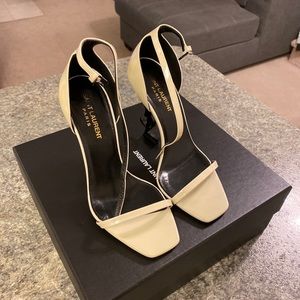 YSL heels, white with black YSL heel. Worn once. Come with box and dust bags.